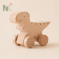 Voitures Dinosaures en Bois à Roulettes – Jouets d’Éveil et d’Imagination