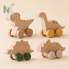 Voitures Dinosaures en Bois à Roulettes – Jouets d’Éveil et d’Imagination